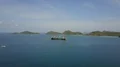 Drone shot Indonesian container ship on Flores Sea near Labuan Bajo coastline 4k or 4k+ Resolution