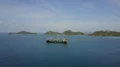 Drone shot Indonesian container ship on Flores Sea near Labuan Bajo coastline 4k or 4k+ Resolution