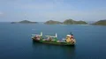Drone shot Indonesian container ship on Flores Sea near Labuan Bajo coastline 4k or 4k+ Resolution
