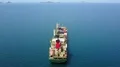 Drone shot Indonesian container ship on Flores Sea near Labuan Bajo coastline 4k or 4k+ Resolution