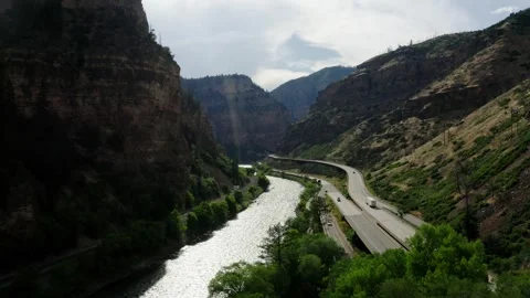 Drone shot of Interstate 70 running parallel to the Colorado River through Video stock 316760206