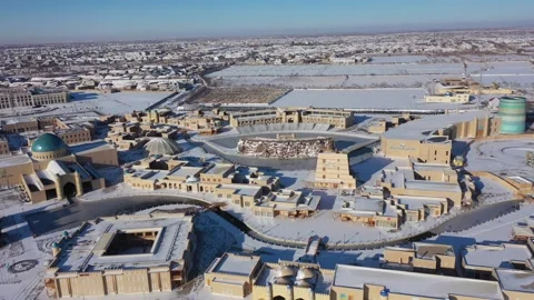 Drone Shot of Khiva Ancient Walled Fortress Town Covered in Snow Stock Footage 345816564