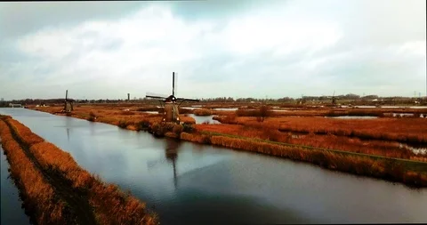Drone shot of Kinderdijk with boat Stock Footage 101141451