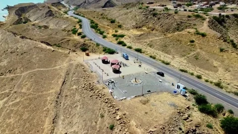 Drone Shot of Kund Malir Roadside Rest Area and Mountainous Beach Landscape Stock Footage 341125059