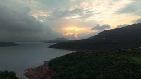 Drone shot of lake during sunset with dramatic clouds 4K25 스톡 동영상 332893328