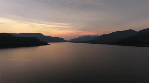 Drone shot of lake during sunset with dramatic clouds 4K60 库存影片 332893330