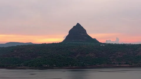 Drone shot of lake during sunset with dramatic clouds 4K30 库存影片 332893398