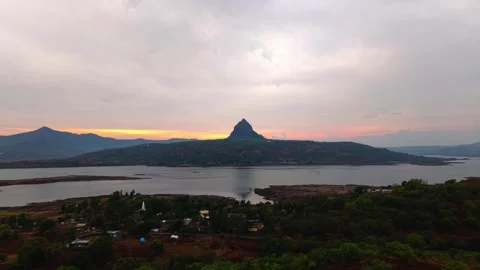 Drone shot of lake during sunset with dramatic clouds 4K30 스톡 동영상 332893400