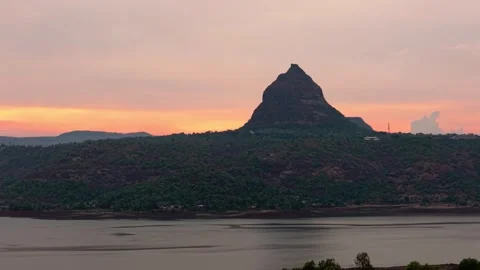 Drone shot of lake during sunset with dramatic clouds 4K30 스톡 동영상 332893406