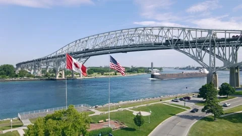Drone Shot of Lake Freighter approaching Blue Water Bridge Stock Footage 312001806