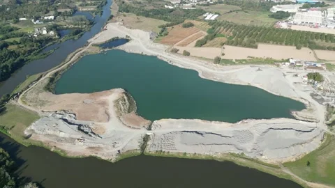 Drone shot of a lake next to a river Stock Footage 214311898