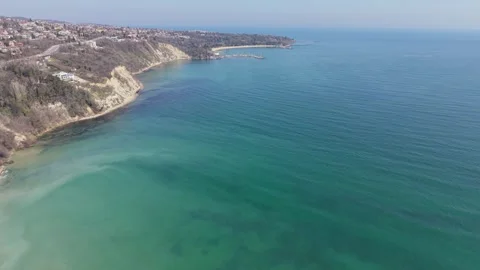 Drone shot large cargo vessel traveling across calm ocean Vídeos de archivo 331235833