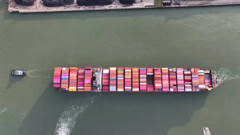 Drone shot of a large container ship entering or leaving port Stock Footage 294700820