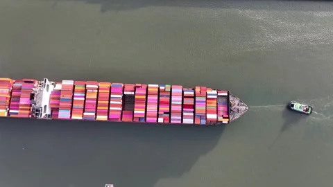 Drone shot of a large container ship entering or leaving port Stock Footage 303552740