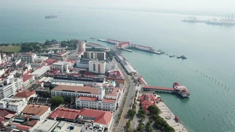 Drone shot less car move near Swettenham Pier during lock down. Видео 132788973