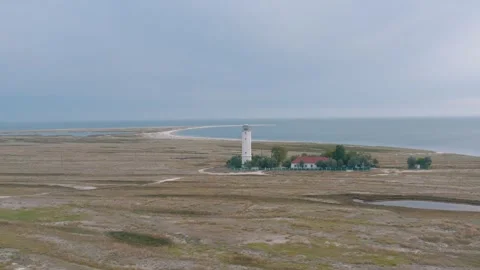 Drone shot of lighthouse on the coastline Stock Footage 255623766