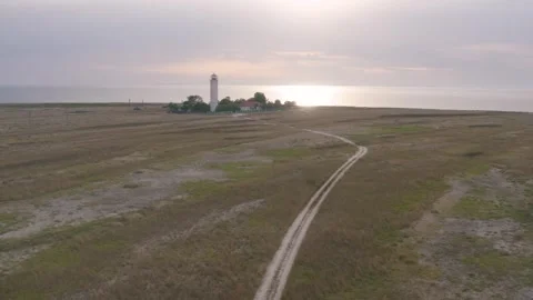 Drone shot of lighthouse on the coastline Stock Footage 255623815