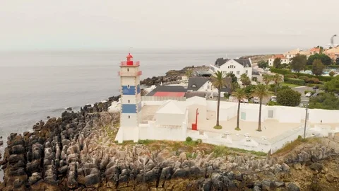 Drone shot of lighthouse at ocean shore Stock-Footage 105286985