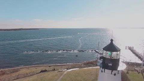 Drone shot of lighthouse by the water Stock-Footage 84950212