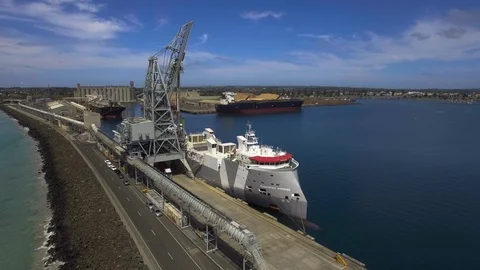Drone shot of livestock ship loading livestock. Stock Footage 86917052