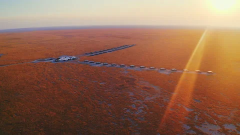 Drone Shot of Lodge in a Desert in Namibia by sunrise Vidéo 170358530