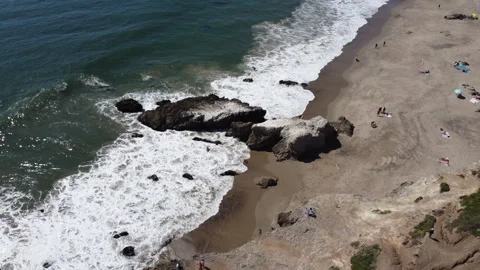 Drone shot of lone beach rock formation, Malibu, CA Stock Footage 271104448