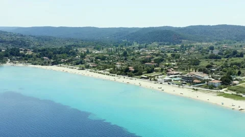 Drone shot of long sandy beach and blue sea. Stock Footage 133389854