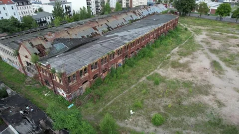 Drone shot looking down at the abandoned Swiderski factory in Leipzig, Germany Stock Footage 161882196