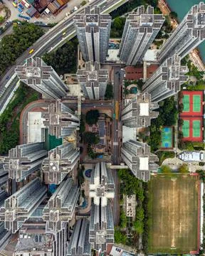 Drone shot looking down on multiple buildings in hong kong china Stock Photos