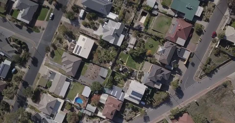 Drone shot looking down over Australian suburban houses &amp; real estate in 4k Stock Footage 108366434