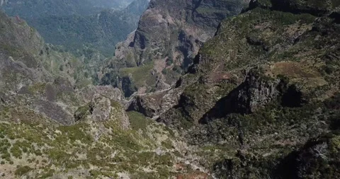 Drone shot - Low move out over steep ravine Madeira mountains Clip 2 Stock Footage 140623276