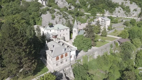 Drone Shot of Lower Ostrog Monastery and Surrounding Buildings, Montenegro Stock Footage 310335531