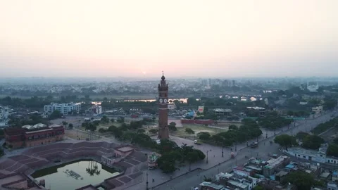 Drone shot of Lucknow’s Clock Tower at sunrise, highlighting its iconic Stock Footage 299250047