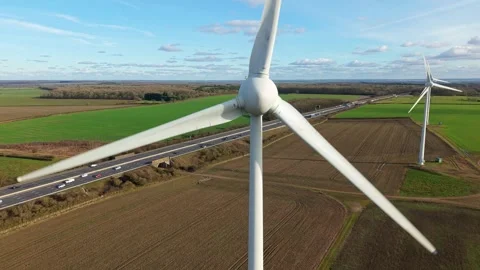 Drone Shot of M1 Wind Farm Infrastructure Northamptonshire Stock Footage 337440224