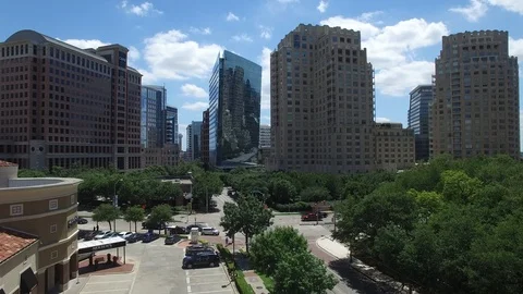 Drone shot of McKinney & Olive building Dallas TX Stock Footage