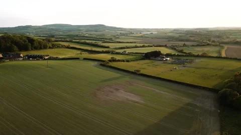 Drone shot of the meadows in the evening sun Stock Footage 247055581