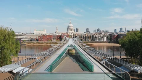 Drone shot Millenium bridge and St. Paul's Cathedral, almost nobody - 4K Stock Footage 129306791