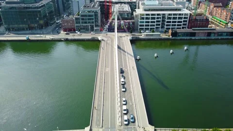 Drone shot of a modern bridge crossing a river. Stock Footage 327684538