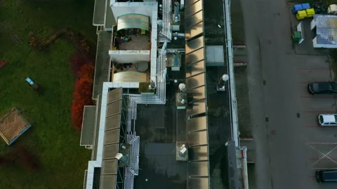 Drone shot on modern multi-apartment buildings with solar panels on the roofs. Stock Footage 201110896