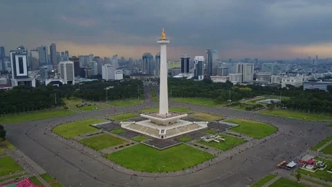 Drone shot of Monas tower and skyline of... | Stock Video | Pond5