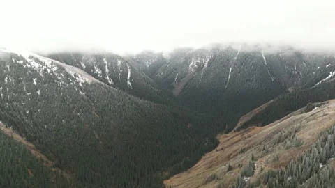 Drone shot on the mountains in cloudy weather Stock Footage 227124161