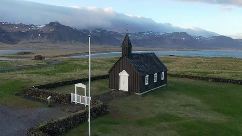 Drone shot moving around Budir black church Stock Footage 112310120