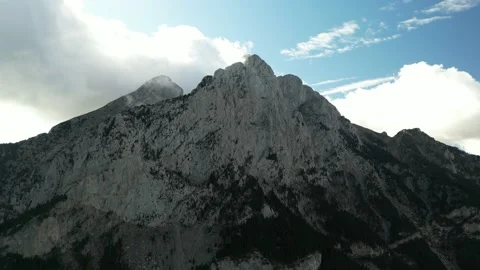 Drone shot moving away from the mountain Stock Footage 228642917
