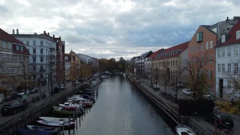 Drone shot moving forward above a canal in Copenhaguen city Stock Footage 221147720