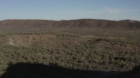 Drone shot moving over, and from a mountain ravine Stock Footage 191047568