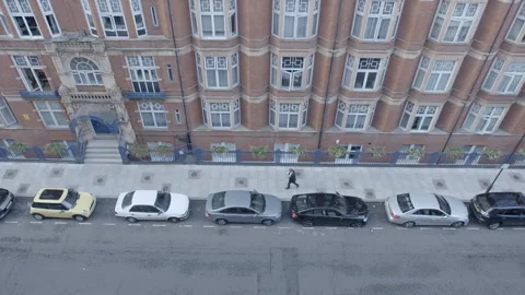 Drone Shot Moving Up Red Brick Residential Building Facade 스톡 동영상 343101535