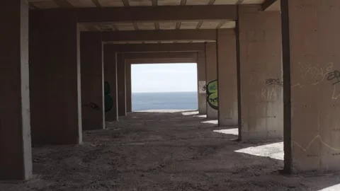 Drone shot moving through an abandoned hotel in Tenerife, Spain   Stock-Footage 248637608