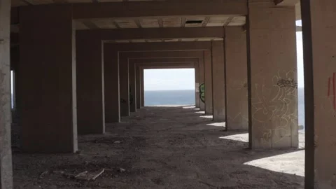 Drone shot moving through an abandoned hotel in Tenerife, Spain   库存影片 248637609