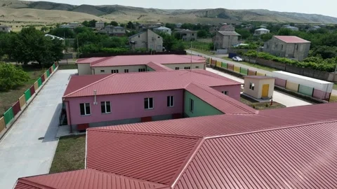 Drone shot of a newly constructed one-story school or preschool building Video stock 331119817