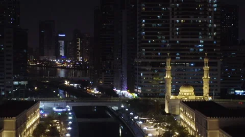 A drone shot of a night city, between the skyscrapers. 스톡 동영상 201091431